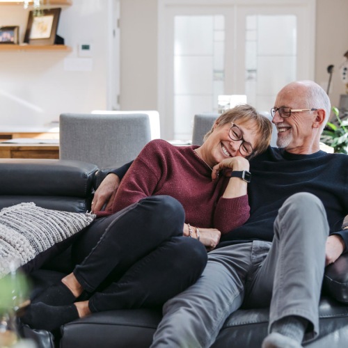 a couple sitting on a couch