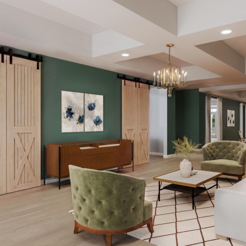Resident lounge at The Summerfield Apartments in Midlothian, VA, featuring wood grain floor paneling.